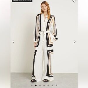 Zimmermann set includes a shirt in size 0 and trousers in size 1.